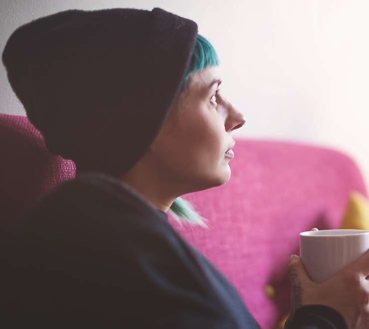 teen indoors mug pensive